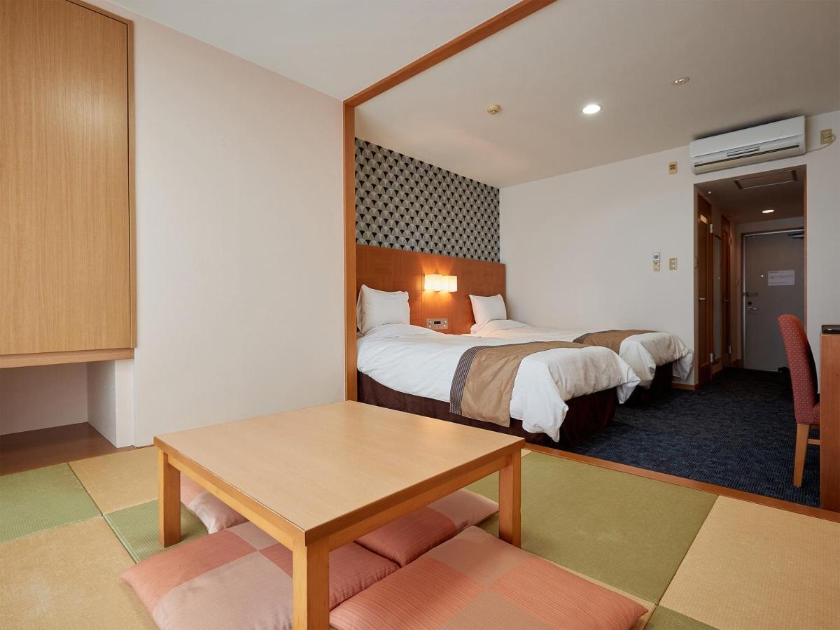 Hotel Murasakimura Йомитан Екстериор снимка