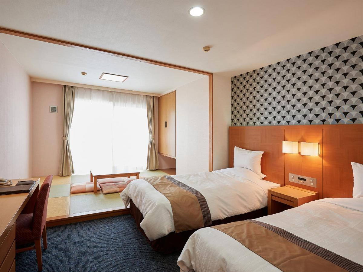 Hotel Murasakimura Йомитан Екстериор снимка