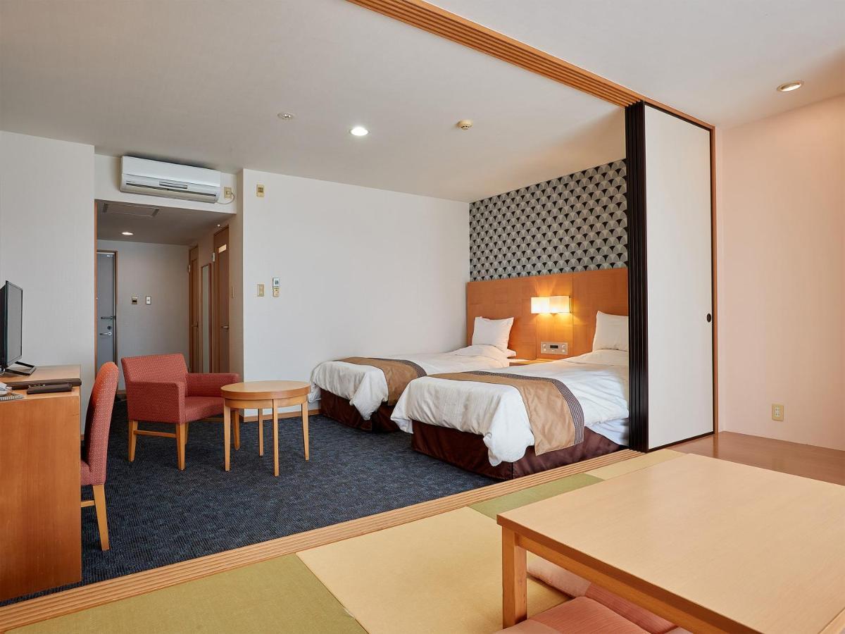 Hotel Murasakimura Йомитан Екстериор снимка